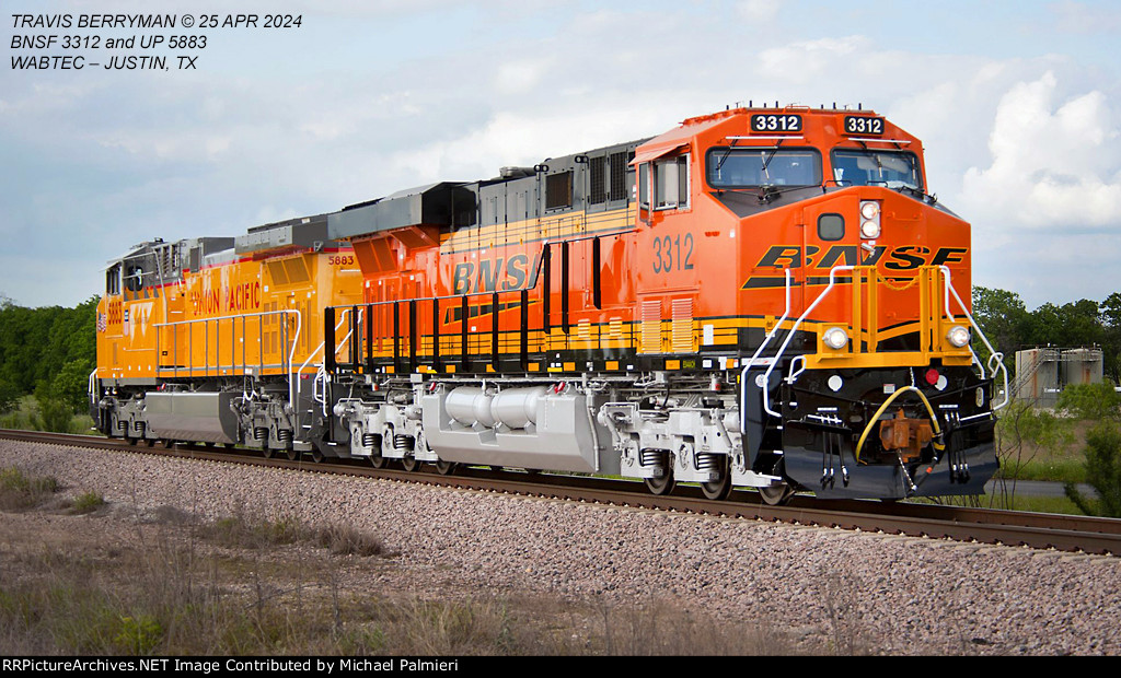 BNSF ES44AC 3312 and UP AC4400CWM 5883